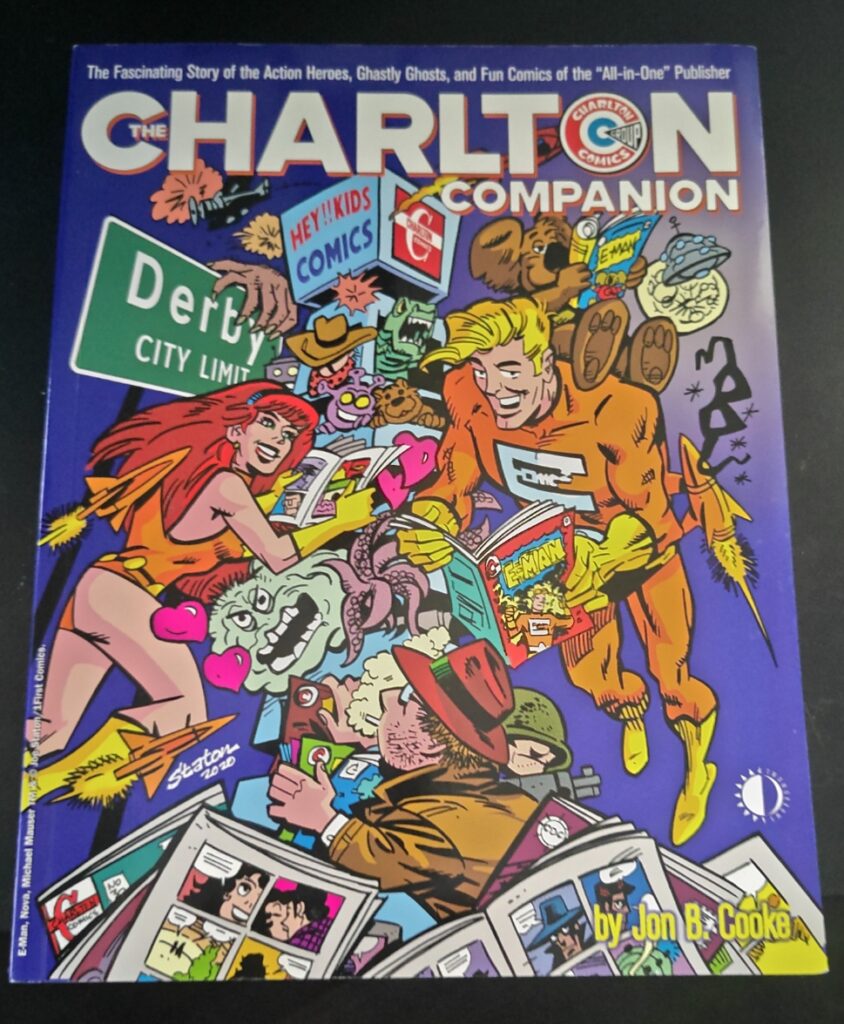 The cover of the book The Charlton Companion by Jon B. Cooke from TwoMorrows Publishing.
